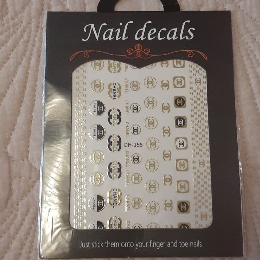 nail decals! Use tweezers to apply